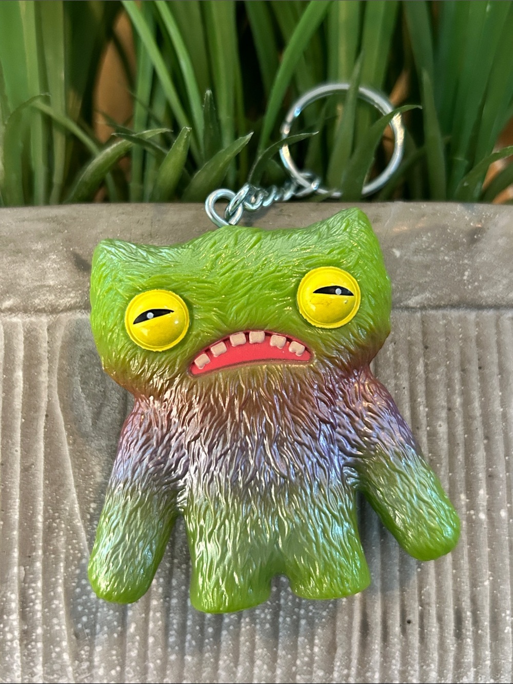 Fuggler Series 2 Wide Eyed Weirdo green and metallic vinyl keychain accessory